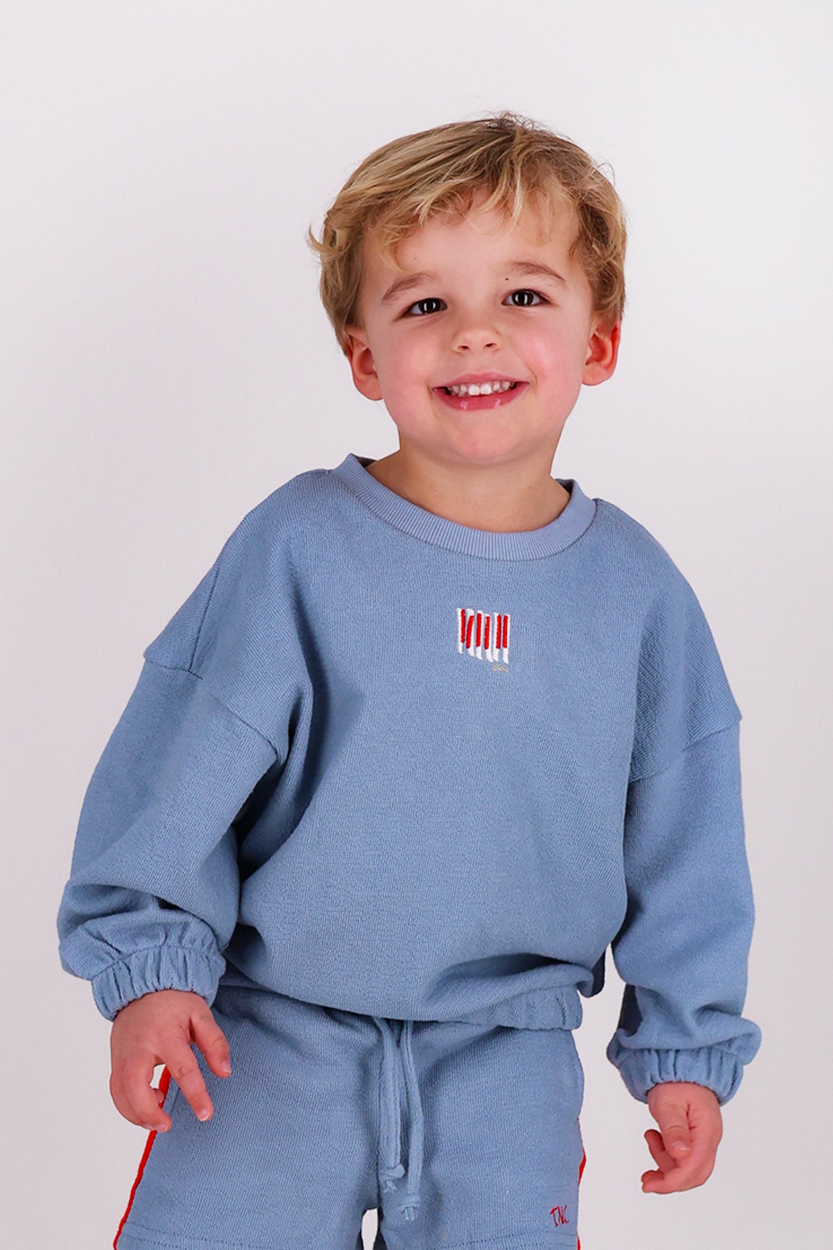 The New Chapter Giant Steps sweater jongens - zijkant detail