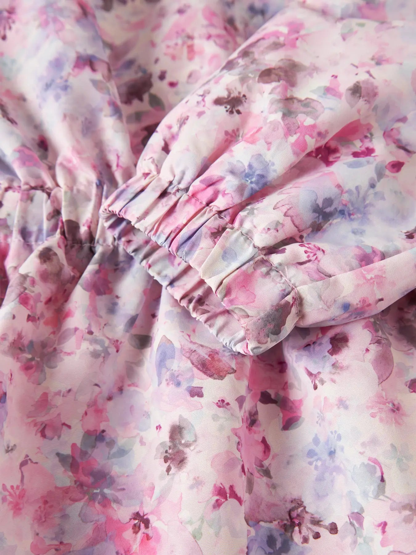 NAME IT regenjas meisjes - close-up stof en printdetail