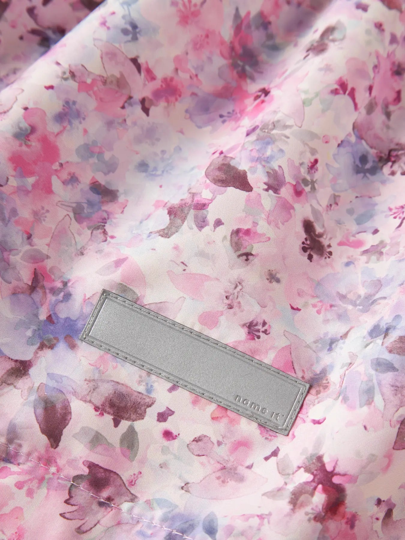 NAME IT waterdichte regenjas meisjes - zijkant met all-over print