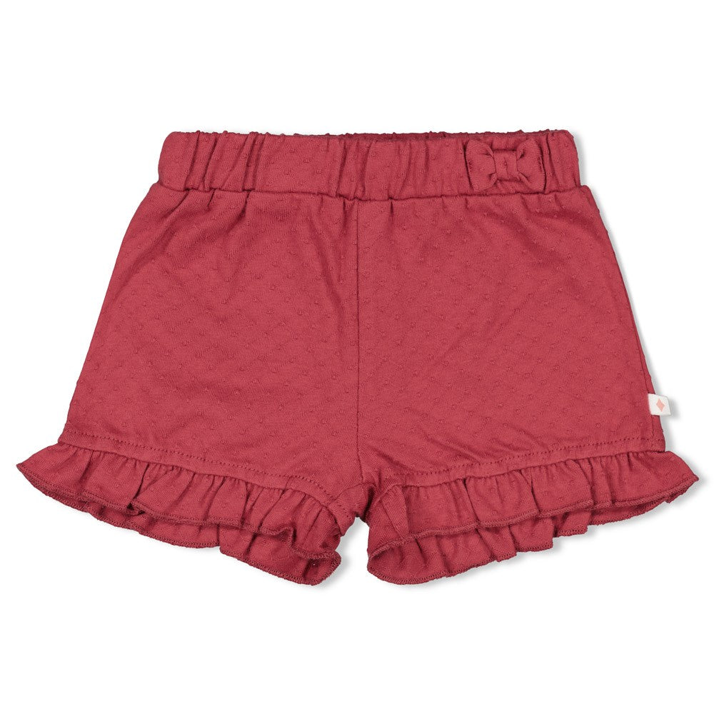 FEETJE meisjesshort met ruffle details aan de pijpen - voorkant roze babykleding
