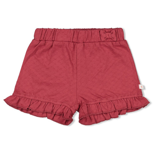 FEETJE meisjesshort met ruffle details aan de pijpen - voorkant roze babykleding